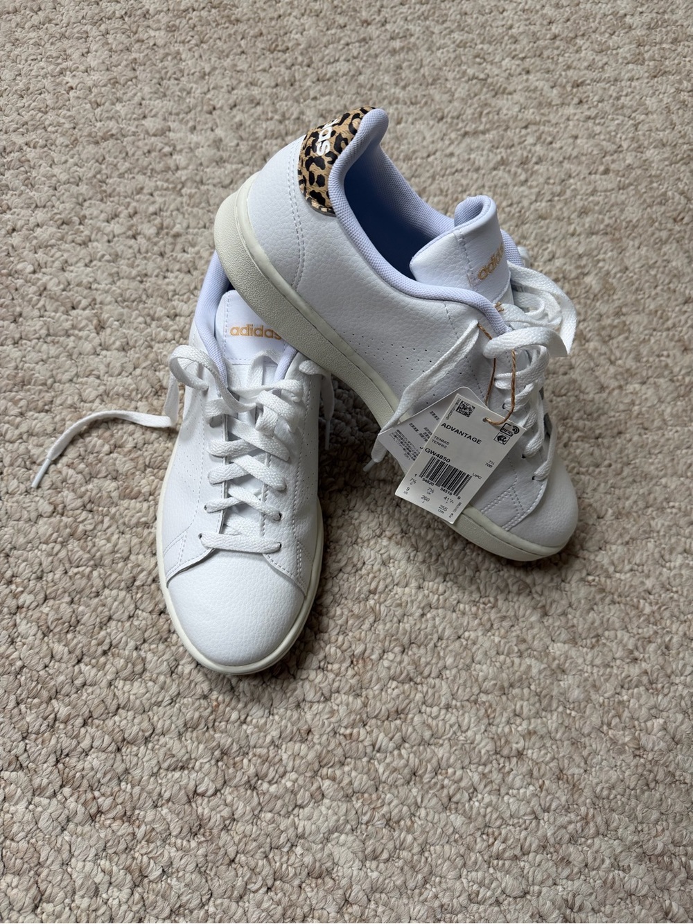 Women’s Adidas white/leopard tennis shoes. Size 9
